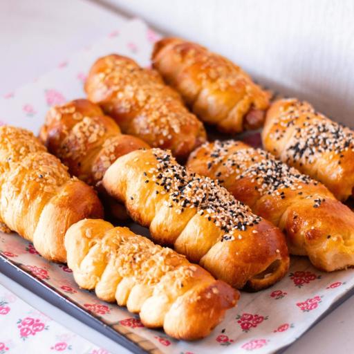 Bakendales sausage rolls, baked to a golden-brown finish with visible layers of flaky pastry