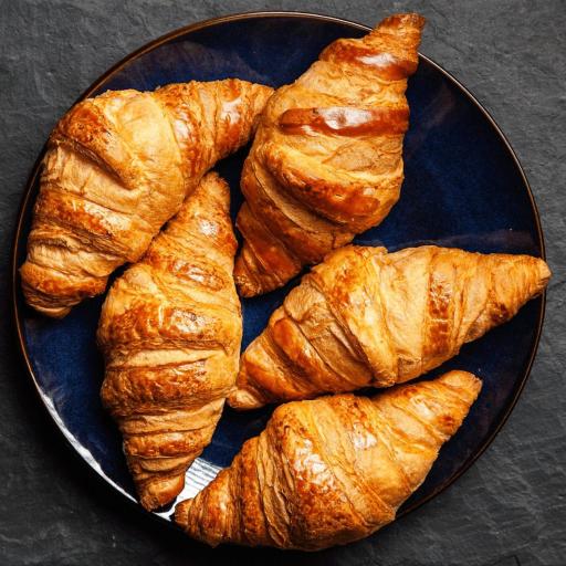 A flaky, golden-brown Bakendales standard croissant
