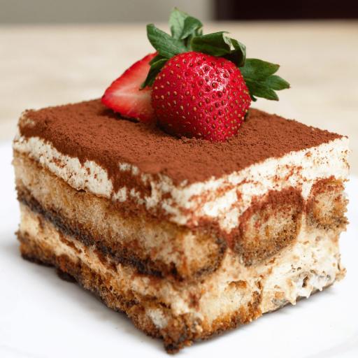 A slice of rich Bakendales tiramisu, layered with coffee-soaked ladyfingers and creamy mascarpone.